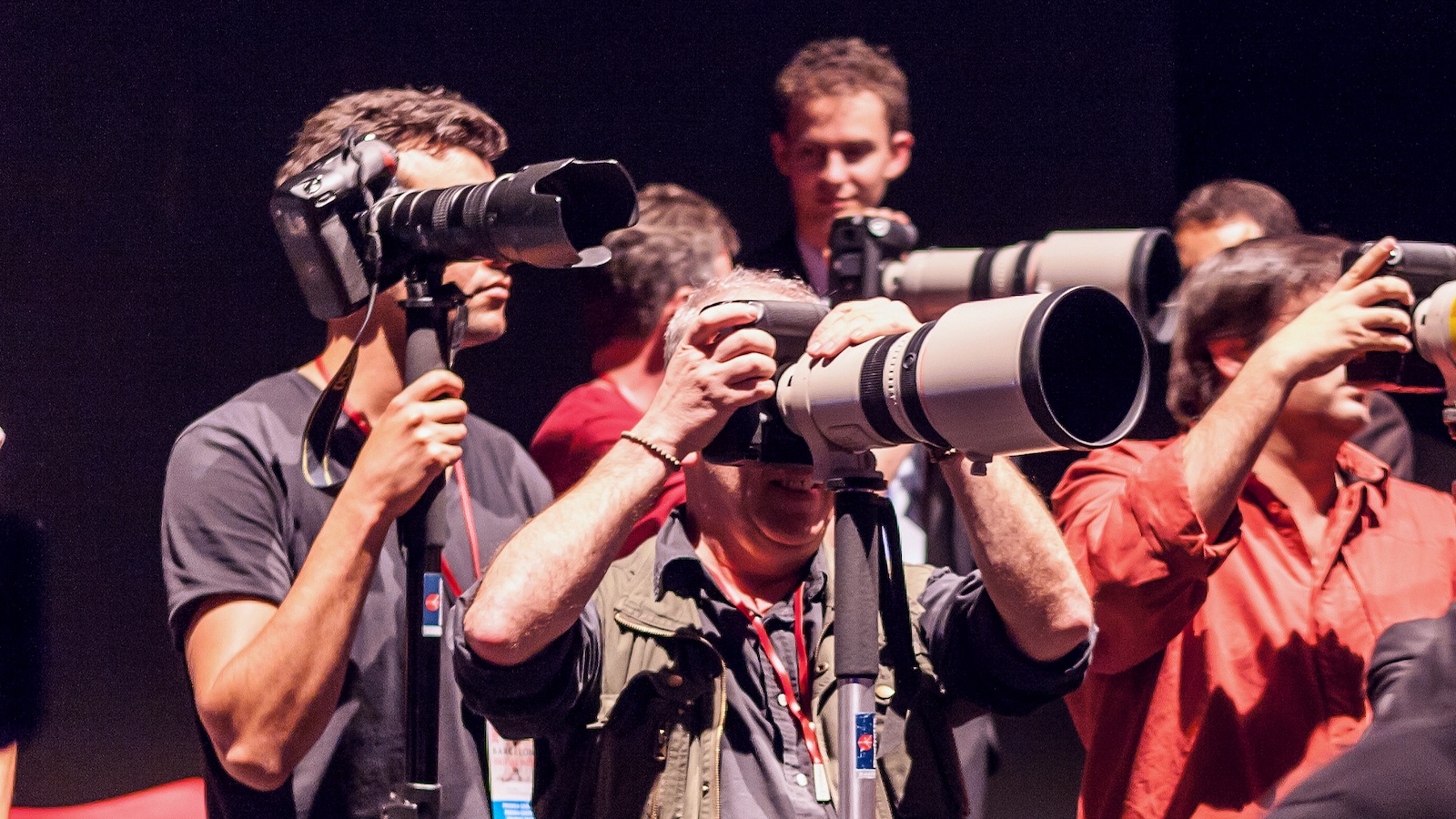 Photographers at work with long lenses